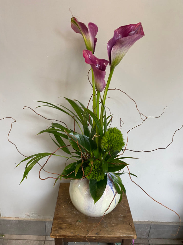 Calla and twigs arrangement