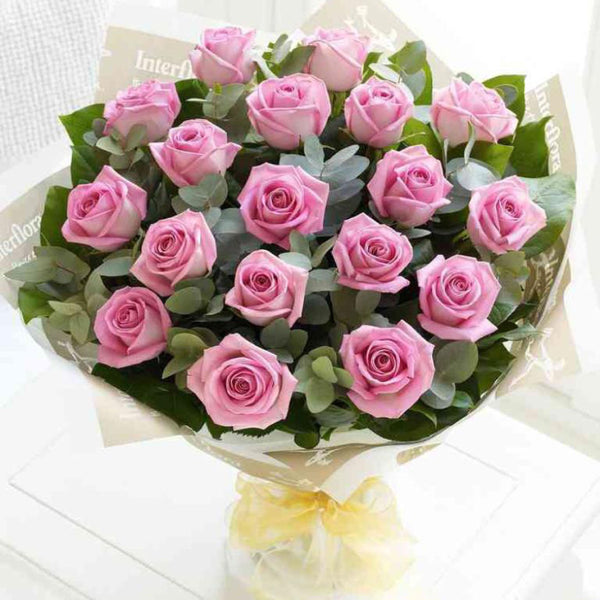 Pink roses and eucalyptus bouquet